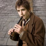 Charlie Rowe plays a tune as Peter.