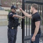 SHARKNADO 3: OH HELL NO!  -- Pictured:  (l-r) Reza Farahan as Capitol Park Policeman, Ian Ziering as Fin Shepard -- (Photo by: Jack Zeman/The Global Asylum/Syfy)