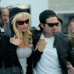 Pam & Tommy -- Set in the Wild West early days of the Internet, PAM & TOMMY tells the incredible true story of the Pam Anderson (LILY JAMES) and Tommy Lee (SEBASTIAN STAN) sex tape. Stolen from the couple’s home by a disgruntled carpenter (SETH ROGEN), the video went from underground bootleg-VHS curiosity to full-blown global sensation when it hit the Web in 1997. A love story, crime caper and cautionary tale rolled into one, the eight-part Hulu limited series explores the intersection of privacy, technology and celebrity, tracing the origins of our current Reality TV Era to a tape seen by millions but meant to have an audience of just two. Pam (Lily James) and Tommy (Sebastian Stan), shown. (Photo by: Erin Simkin/Hulu)