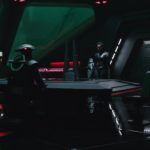 Fifth Brother (Sung Kang, seated on right) and Reva (Moses Ingram, standing) in Lucasfilm's OBI-WAN KENOBI, exclusively on Disney+. © 2022 Lucasfilm Ltd. & ™. All Rights Reserved.