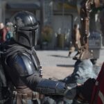 (L-R): Grogu, Din Djarin (Pedro Pascal) and Greef Karga (Carl Weathers) in Lucasfilm's THE MANDALORIAN, season three, exclusively on Disney+. ©2023 Lucasfilm Ltd. & TM. All Rights Reserved.