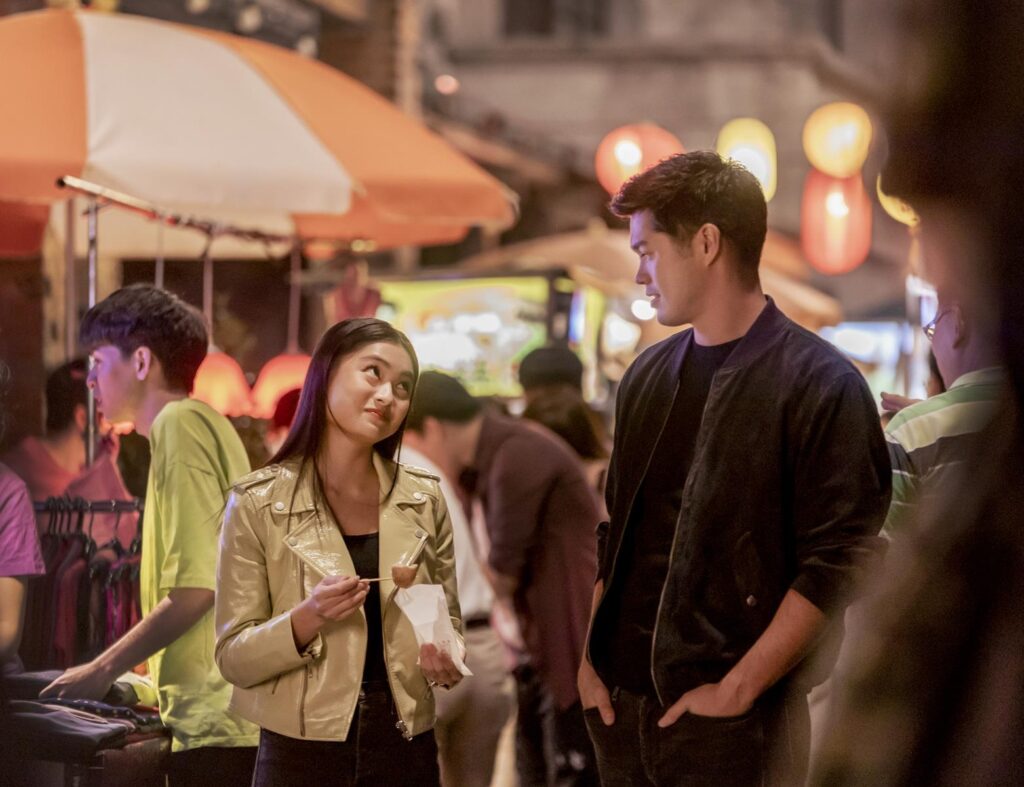 (L-R) Ashley Liao as Ever Wong and Ross Butler as Rick Woo in Love in Taipei, streaming on Paramount+, 2023. Photo credit: Dragon 5/Paramount+  © 2022 Lions Gate Films, Inc. and Vicarious Entertainment, LLC d/b/a Ace Entertainment. All rights reserved.