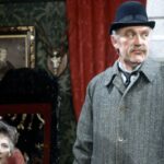 Joss Ackland (Grubber) and Kathleen Byron (Miss Lyle) – Courtesy of BritBox