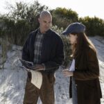 Selects: Scene 133 - Day E1D3 EXTERIOR: Mitchell's Plain Dunes - Chris (IVAN ZIMMERMANN) and Micki (CHARLOTTE HOPE) have arrived at the dunes, they walk up the dune path, survey the dunes.