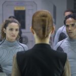 Christie Burke (“LT. Sharon Garnet), Reece Ritchie (LT. Spencer Lane), Jelena Stupljanin (“Evelyn Maddox”) - Credit: Aleksandar Letic/Ark TV Holdings, Inc./SYFY