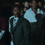 FIGHT NIGHT: THE MILLION DOLLAR HEIST -- Episode 101 -- Pictured: (l-r) Don Cheadle as JD Hudson, Dexter Darden as Muhammad Ali -- (Photo by: Eli Joshua Adé/PEACOCK)