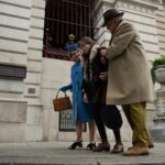 L-R Dianne Wiest as Minnie Castavet, Julia Garner as Terry Gionoffrio and Kevin McNally as Roman Castavet in Apartment 7A, streaming on Paramount+ 2024. Photo Credit: Gareth Gatrell/Paramount+.