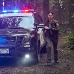 SHERIFF COUNTRY (Fridays, 8:00-9:00 PM) stars Morena Baccarin as straight-shooting sheriff Mickey Fox, the stepsister of Cal Fire’s division chief Sharon Leone (Diane Farr of FIRE COUNTRY), who investigates criminal activity as she patrols the streets of small-town Edgewater while contending with her ex-con father, Wes (W. Earl Brown), who is an off-the-grid marijuana grower, and a mysterious incident involving her wayward daughter. SHERIFF COUNTRY is an expansion of the universe of the hit drama series FIRE COUNTRY.  Pictured: Morena Baccarin as Sheriff Mickey Fox on the CBS original series FIRE COUNTRY. Photo: Hugh Tull/CBS ©2025 CBS Broadcasting, Inc. All Rights Reserved.