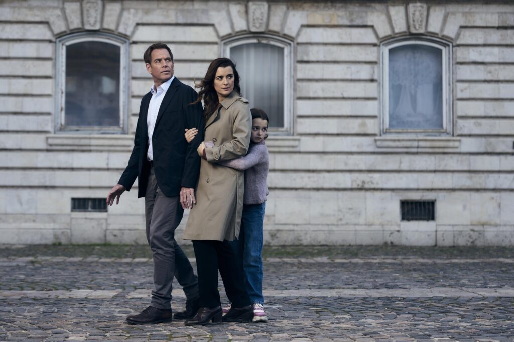 L-R Michael Weatherly as Tony Dinozzo, Cote de Pablo as Ziva David  and Isla Gie as Tali In NCIS: Tony & Ziva, season 1, airing on Paramount+ 2025. Photo Credit: Jason Bell/Paramount+