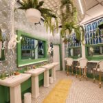 ‘Mystery Hotel Theme’ Set Plates of the Big Brother House for season 27 of the CBS Original Series BIG BROTHER, scheduled to air on the CBS Television Network.  Pictured: Victorian Conservatory Lounge: A lush, plant-filled room with a 13-foot green velvet lounge and a plum tree, perfect for quiet strategy sessions. Photo: Matthew Taplinger ©2025 CBS Broadcasting, Inc. All Rights Reserved.