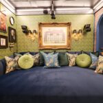 ‘Mystery Hotel Theme’ Set Plates of the Big Brother House for season 27 of the CBS Original Series BIG BROTHER, scheduled to air on the CBS Television Network.  Pictured: Venom Lounge & Poison Bar: Upstairs, snakes slither across the wallpaper in a moody lounge featuring a “Poison Bar,” (don’t worry, there is no actual poison) a velvet daybed, and ravens stealing party lights. Photo: Matthew Taplinger ©2025 CBS Broadcasting, Inc. All Rights Reserved.