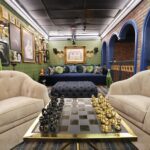 ‘Mystery Hotel Theme’ Set Plates of the Big Brother House for season 27 of the CBS Original Series BIG BROTHER, scheduled to air on the CBS Television Network.  Pictured: Venom Lounge & Poison Bar: Upstairs, snakes slither across the wallpaper in a moody lounge featuring a “Poison Bar,” (don’t worry, there is no actual poison) a velvet daybed, and ravens stealing party lights. Photo: Matthew Taplinger ©2025 CBS Broadcasting, Inc. All Rights Reserved.