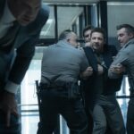 L-R: Clayton Cardenas as Torres and Jeremy Renner as Mike McLusky in Mayor of Kingstown season 4, streaming on Paramount+, 2025. Credit: Dennis P. Mong Jr./Paramount+ ©2025 Viacom International Inc. All Rights Reserved. Mayor of Kingstown and all related titles, logos and characters are trademarks of Viacom International Inc.