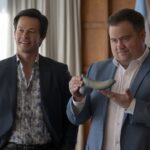 Brad (Mark Wahlberg) and Elijah (Paul Walter Hauser) in BALLS UP.  Photo Credit: Ben Rothstein Prime Video © Amazon Content Services LLC