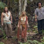 Eco Warrior PJ (Hal Cumpston), Eco Warrior Julie (Chelsey Crisp), and Eco Warrior Aaron (Eric André) in BALLS UP. Photo Credit: Ben Rothstein Prime Video © Amazon Content Services LLC