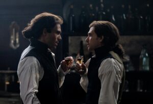 LtoR: François Civil as Charles Darnay and Kit Harington as Sydney Carton