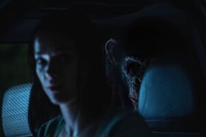 Jessica Alexander as 'Hannah' and Miguel Torres Umba as 'Ben' in Primate from Paramount Pictures.