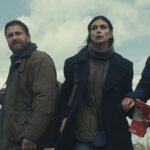 Gerard Butler as John Garrity, Morena Baccarin as Allison Garrity, and Roman Griffin Davis as Nathan Garrity in Greenland 2: Migration. Photo Credit: Courtesy of Lionsgate