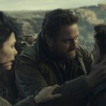 Morena Baccarin as Allison Garrity, Gerard Butler as John Garrity and Roman Griffin Davis as Nathan Garrity in Greenland 2: Migration. Photo Credit: Courtesy of Lionsgate