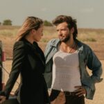 Kayla Wallace as Rebecca Falcone and Guy Burnet as Charlie Newsom in Landman episode 6, season 2, streaming on Paramount+. Photo Credit: Emerson Miller/Paramount+