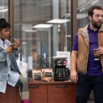 THE PAPER -- Episode 103 -- Pictured: (l-r) Gbemisola Ikumelo as Adelola, Eric Rahill as Travis -- (Photo by: Aaron Epstein/PEACOCK)