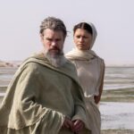 L to R: Matt Damon is Odysseus and Zendaya is Athena in THE ODYSSEY, written, produced, and directed by Christopher Nolan.